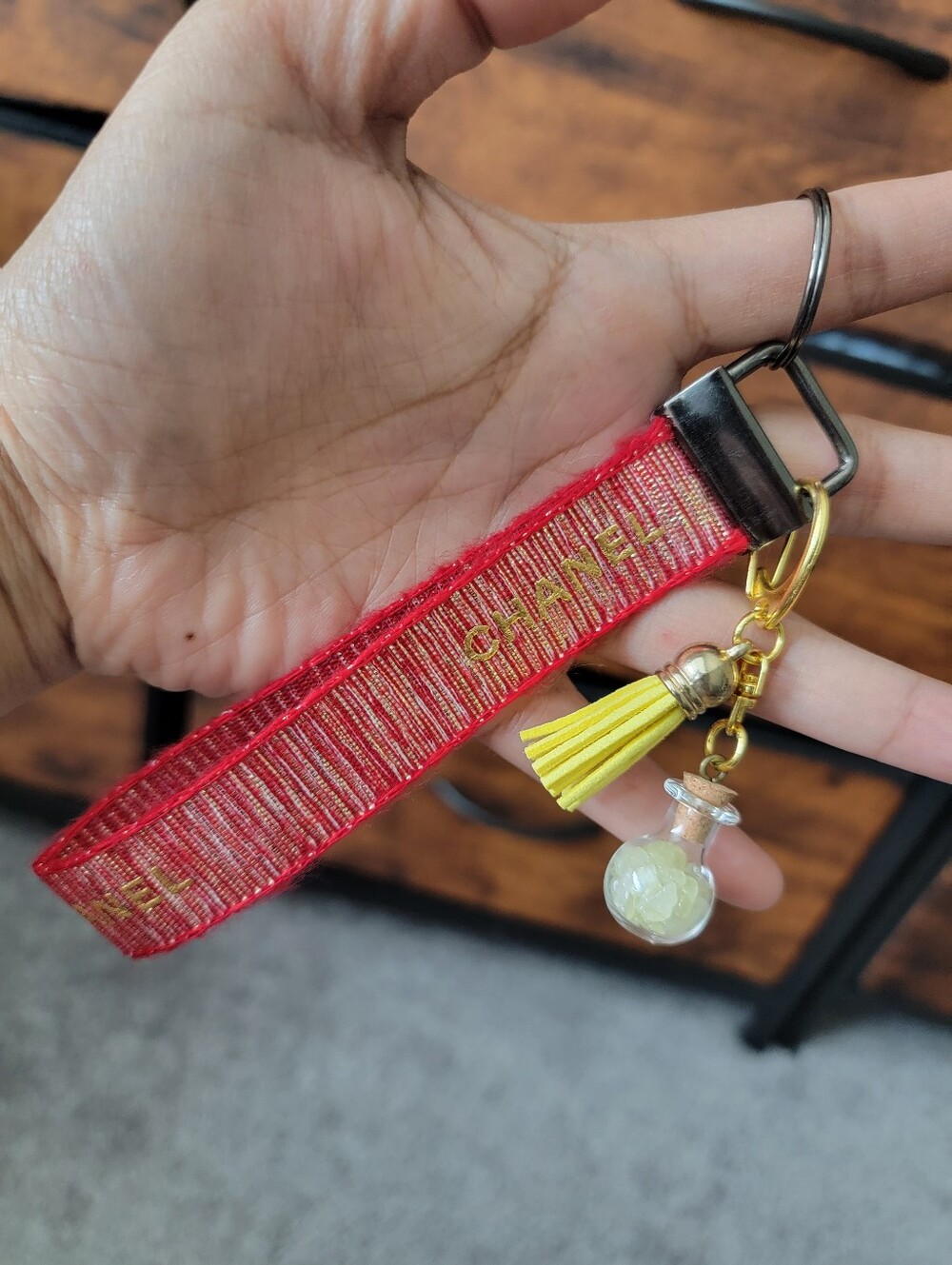 CHANEL Red Ribbon Keyring with Yellow Tassel and Gold Hardware